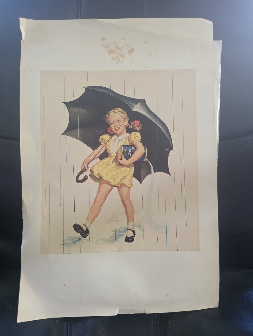 When it rains it pours - Morton Salt girl under an umbrella ad 1952 WD